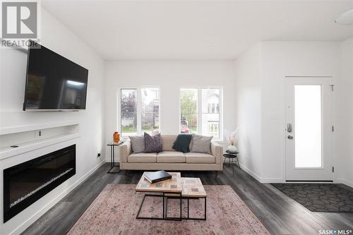 5206 Squires Road, Regina, SK - Indoor Photo Showing Living Room With Fireplace