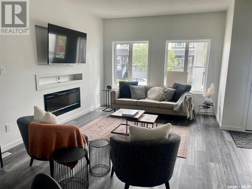 5206 Squires Road, Regina, SK - Indoor Photo Showing Living Room With Fireplace