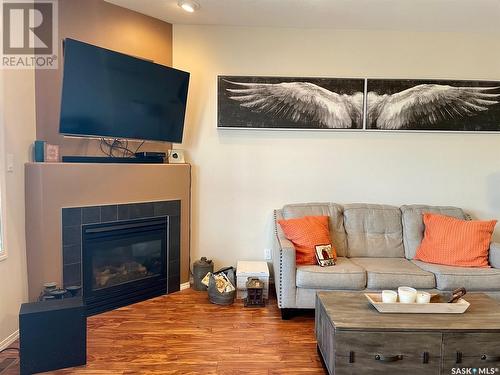 Unit C 328 Morrison Drive, Yorkton, SK - Indoor Photo Showing Living Room With Fireplace