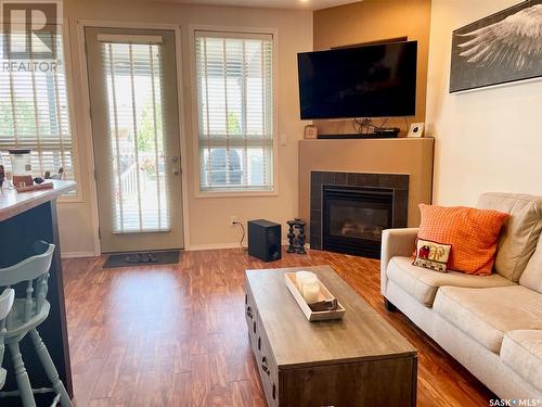 Unit C 328 Morrison Drive, Yorkton, SK - Indoor Photo Showing Living Room With Fireplace