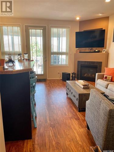 Unit C 328 Morrison Drive, Yorkton, SK - Indoor Photo Showing Living Room With Fireplace