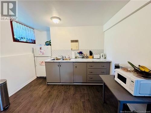 87 Hospital Street, Bath, NB - Indoor Photo Showing Kitchen With Double Sink