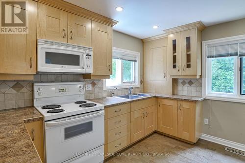 13 Old Indian Trail N, Ramara (Brechin), ON - Indoor Photo Showing Kitchen With Double Sink