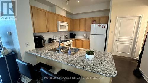 802 - 3525 Kariya Drive, Mississauga, ON - Indoor Photo Showing Kitchen With Double Sink