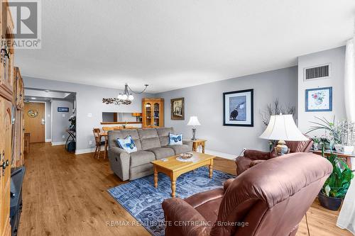 702 - 320 Mill Street S, Brampton, ON - Indoor Photo Showing Living Room