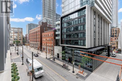 303 - 8 Charlotte Street, Toronto, ON - Outdoor With Facade