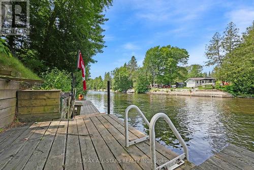 24 River Road, Kawartha Lakes, ON - Outdoor With Body Of Water With Deck Patio Veranda