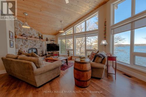 7560 Bamsey Drive, Hamilton Township, ON - Indoor Photo Showing Living Room With Fireplace