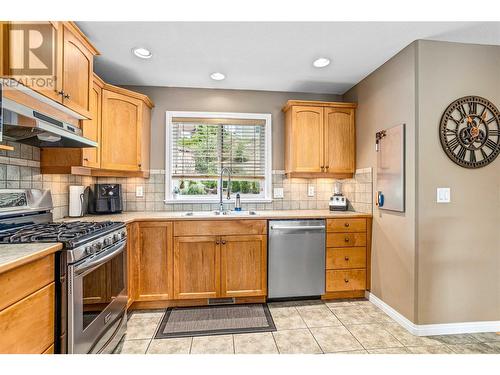 1492 Longley Crescent, Kelowna, BC - Indoor Photo Showing Kitchen With Double Sink