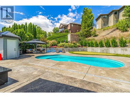 1492 Longley Crescent, Kelowna, BC - Outdoor With In Ground Pool With Backyard