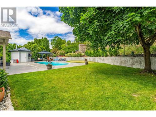 1492 Longley Crescent, Kelowna, BC - Outdoor With In Ground Pool With Backyard