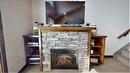 732 B - 700 Bighorn Boulevard, Radium Hot Springs, BC  - Indoor Photo Showing Living Room With Fireplace 