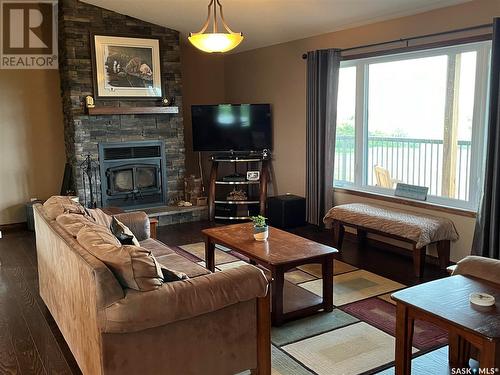 Chandler Acreage, Wood River Rm No. 74, SK - Indoor Photo Showing Living Room With Fireplace