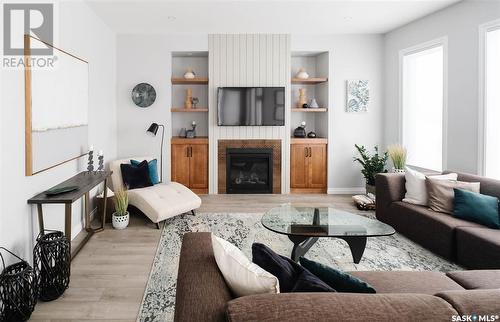 5201 Green Crescent, Regina, SK - Indoor Photo Showing Living Room With Fireplace