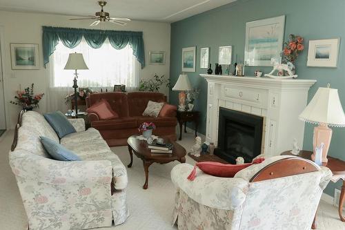 2309 5Th Ave, Castlegar, BC - Indoor Photo Showing Living Room With Fireplace