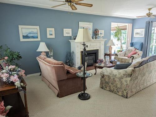 2309 5Th Ave, Castlegar, BC - Indoor Photo Showing Living Room With Fireplace