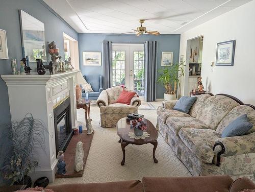 2309 5Th Ave, Castlegar, BC - Indoor Photo Showing Living Room With Fireplace