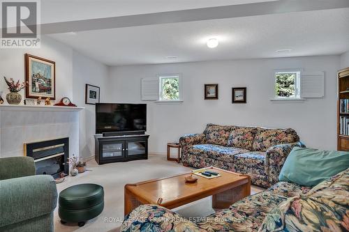 89 Navigators Trail, Kawartha Lakes (Bobcaygeon), ON - Indoor Photo Showing Living Room With Fireplace