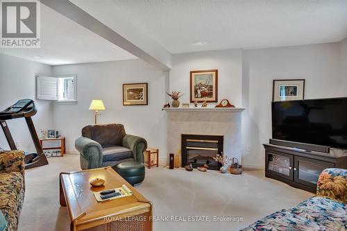 89 Navigators Trail, Kawartha Lakes (Bobcaygeon), ON - Indoor Photo Showing Living Room With Fireplace