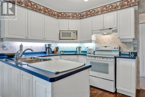 89 Navigators Trail, Kawartha Lakes (Bobcaygeon), ON - Indoor Photo Showing Kitchen With Double Sink