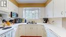 337 20Th  Avenue, Creston, BC  - Indoor Photo Showing Kitchen With Double Sink 