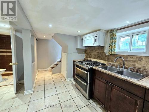 126 Times Road, Toronto W04, ON - Indoor Photo Showing Kitchen With Double Sink