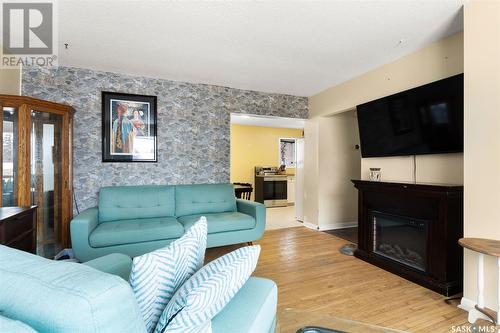 2105 5Th Avenue N, Regina, SK - Indoor Photo Showing Living Room With Fireplace