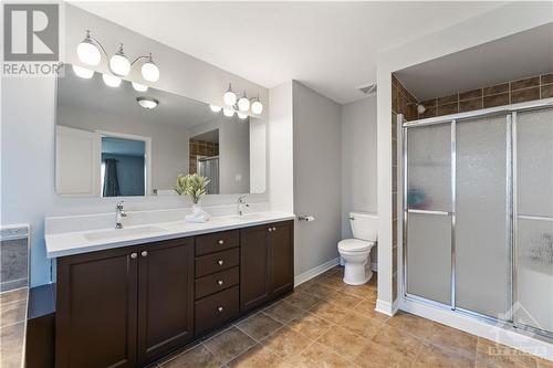 Ensuite with double sink vanity with quartz counters - 284 Calaveras Avenue, Ottawa, ON - Indoor Photo Showing Bathroom
