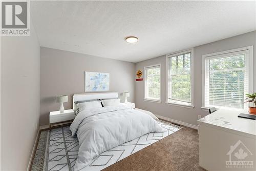 Bright bedroom with large windows for natural light. (virtually staged) - 284 Calaveras Avenue, Ottawa, ON - Indoor Photo Showing Bedroom