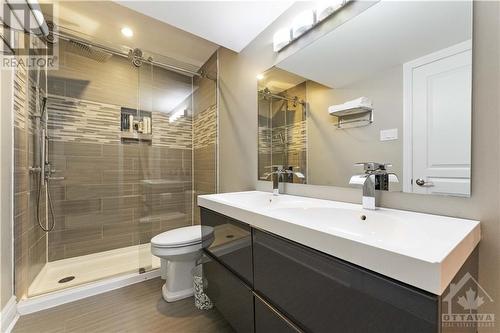 Basement bathroom with walk in shower and double sink vanity - 284 Calaveras Avenue, Ottawa, ON - Indoor Photo Showing Bathroom
