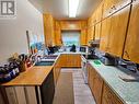 210 1St Street W, Frontier, SK  - Indoor Photo Showing Kitchen With Double Sink 