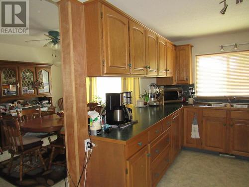 1125 Mountain Street, Robson, BC - Indoor Photo Showing Kitchen With Double Sink