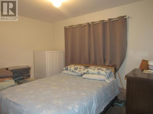 1125 Mountain Street, Robson, BC - Indoor Photo Showing Bedroom