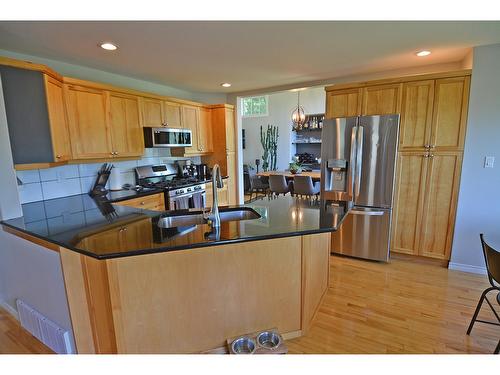 704 Wasson Street, Nelson, BC - Indoor Photo Showing Kitchen With Stainless Steel Kitchen