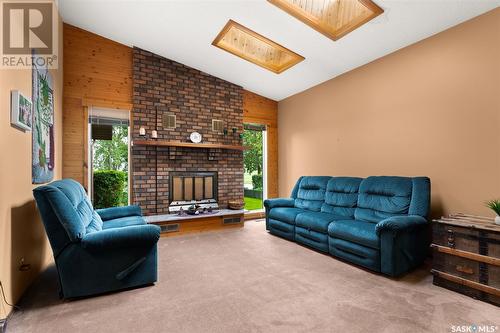 514 Railway Avenue, Pilot Butte, SK - Indoor Photo Showing Living Room With Fireplace