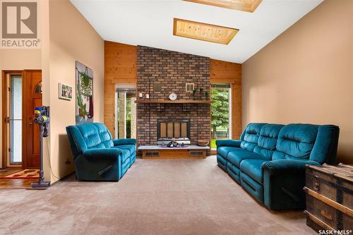 514 Railway Avenue, Pilot Butte, SK - Indoor Photo Showing Living Room With Fireplace