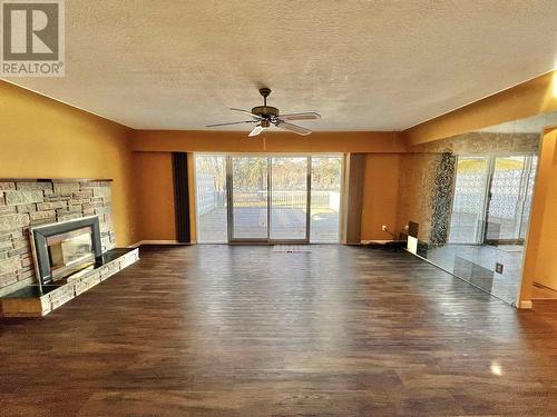 743 Walkem Street, Quesnel, BC - Indoor Photo Showing Other Room With Fireplace