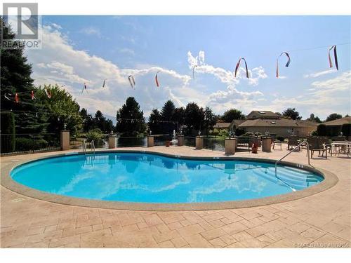 1201 Cameron Avenue Unit# 53, Kelowna, BC - Outdoor With In Ground Pool With Backyard