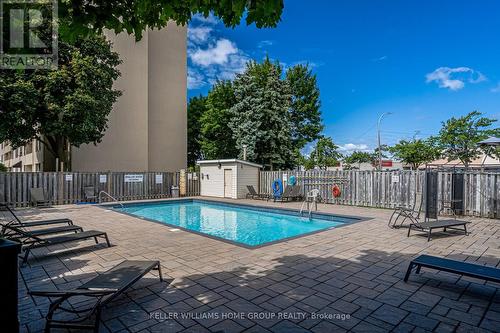 309 - 700 Dynes Road, Burlington, ON - Outdoor With In Ground Pool