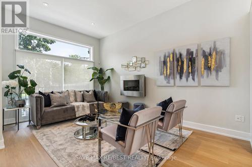 31 Springhurst Avenue, Toronto, ON - Indoor Photo Showing Living Room