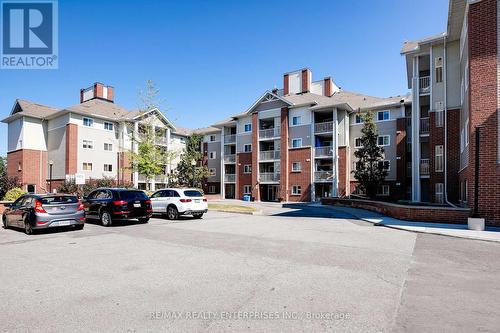 407 - 5225 Finch Avenue E, Toronto E07, ON - Outdoor With Balcony With Facade