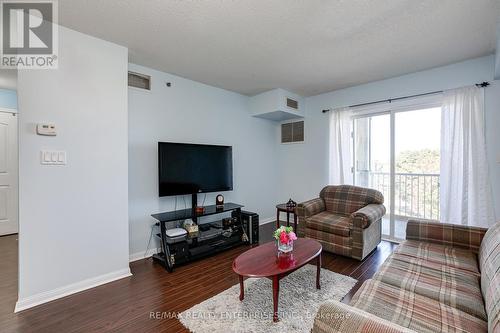 407 - 5225 Finch Avenue E, Toronto E07, ON - Indoor Photo Showing Living Room