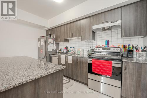 207 - 6 Spice Way, Barrie, ON - Indoor Photo Showing Kitchen With Upgraded Kitchen