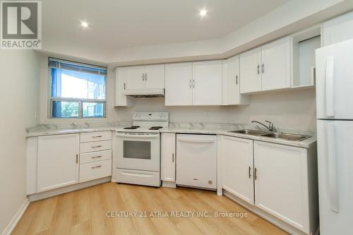 301 - 4725 Sheppard Avenue E, Toronto E07, ON - Indoor Photo Showing Kitchen With Double Sink