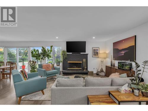 16 Caramillo Road, Kelowna, BC - Indoor Photo Showing Living Room With Fireplace