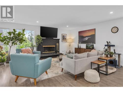 16 Caramillo Road, Kelowna, BC - Indoor Photo Showing Living Room With Fireplace