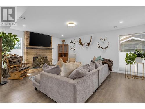 16 Caramillo Road, Kelowna, BC - Indoor Photo Showing Living Room With Fireplace