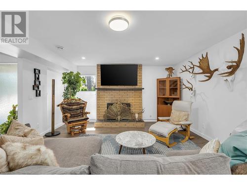 16 Caramillo Road, Kelowna, BC - Indoor Photo Showing Living Room With Fireplace