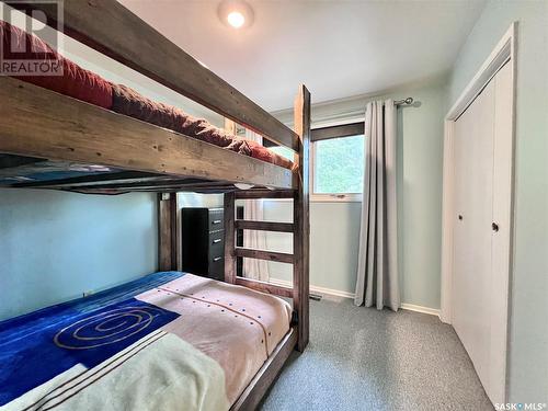 210 Ruby Drive, Hitchcock Bay, SK - Indoor Photo Showing Bedroom