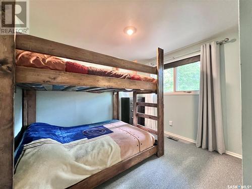 210 Ruby Drive, Hitchcock Bay, SK - Indoor Photo Showing Bedroom